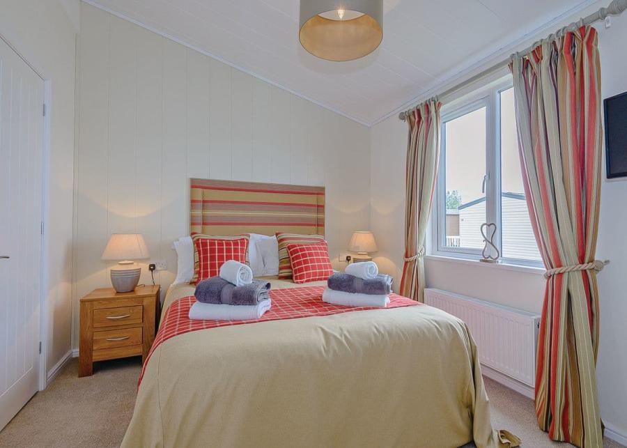 double lodge bedroom at maesmawr farm resort in powys