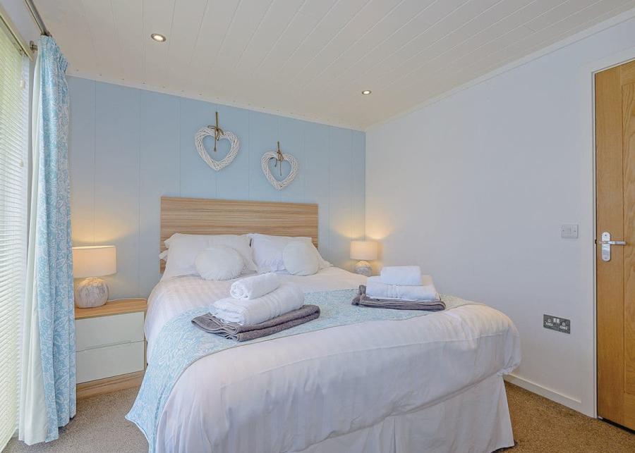 double lodge bedroom at maesmawr farm resort in wales