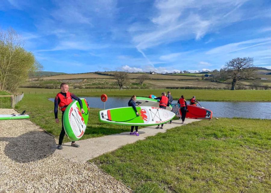paddle boarding at meadow springs country and leisure park in caersws