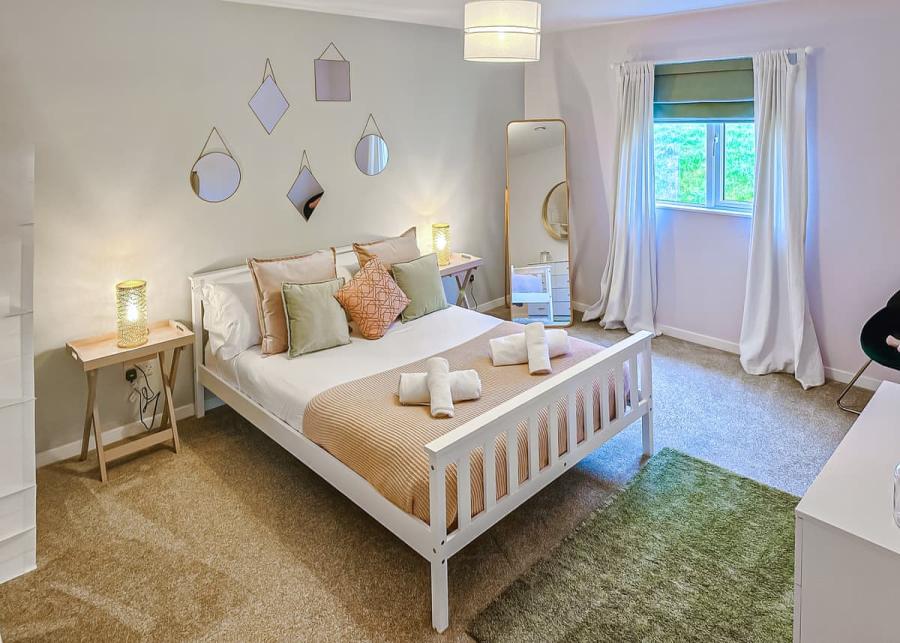 double bedroom at pant wilkin lodges and equestrian centre in cowbridge