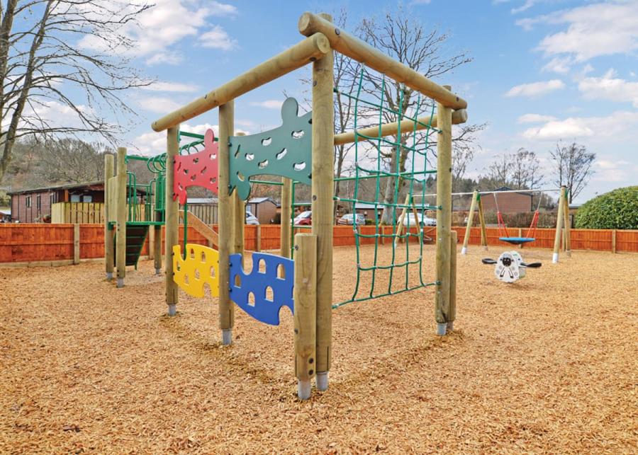 childrens play area at pen-y-garth lodges in bala