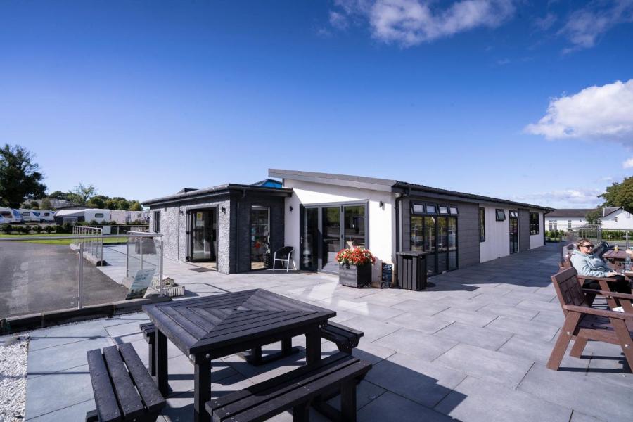 exterior of a luxury lodge at Crofthead Holiday Park