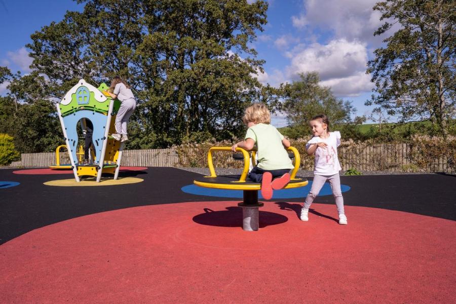 kids having fun on holiday at the park