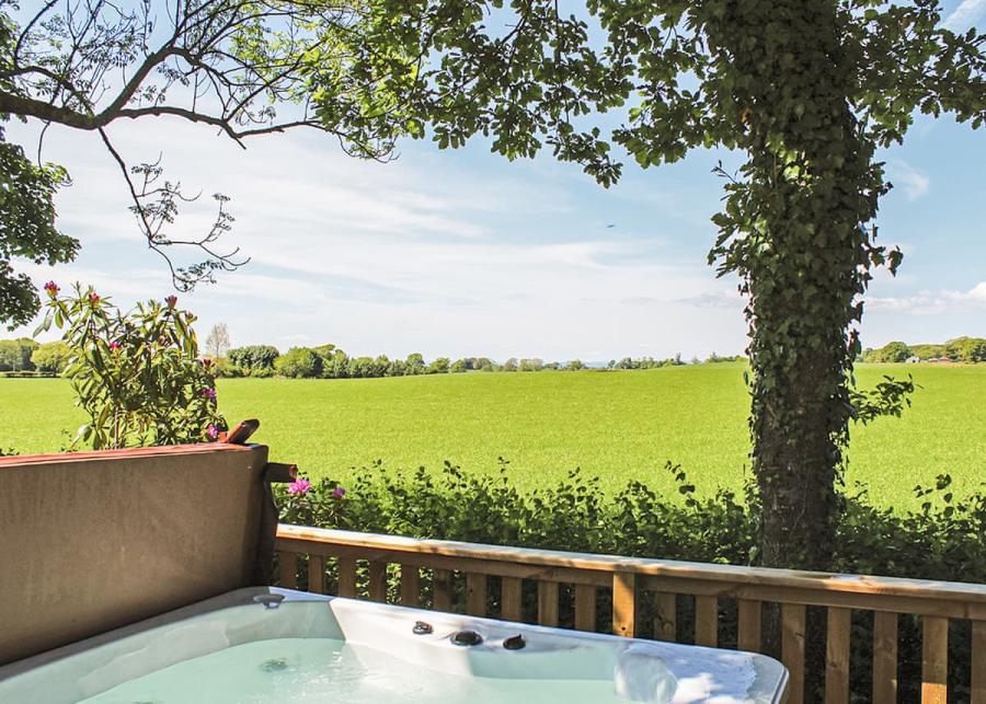 private hot tub at mouswald lodge holiday park  
