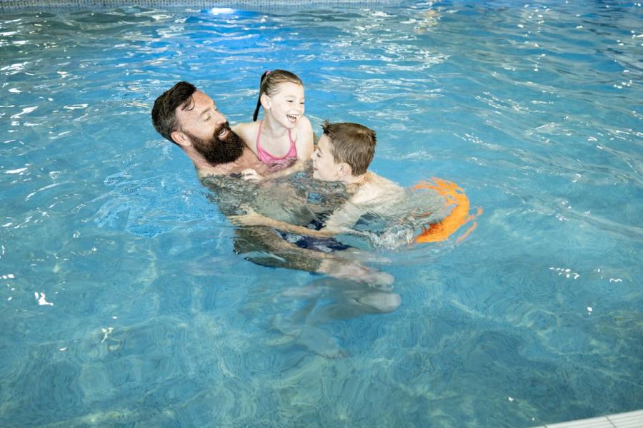 family holiday fun in the swimming pool at Riverside Holiday Park