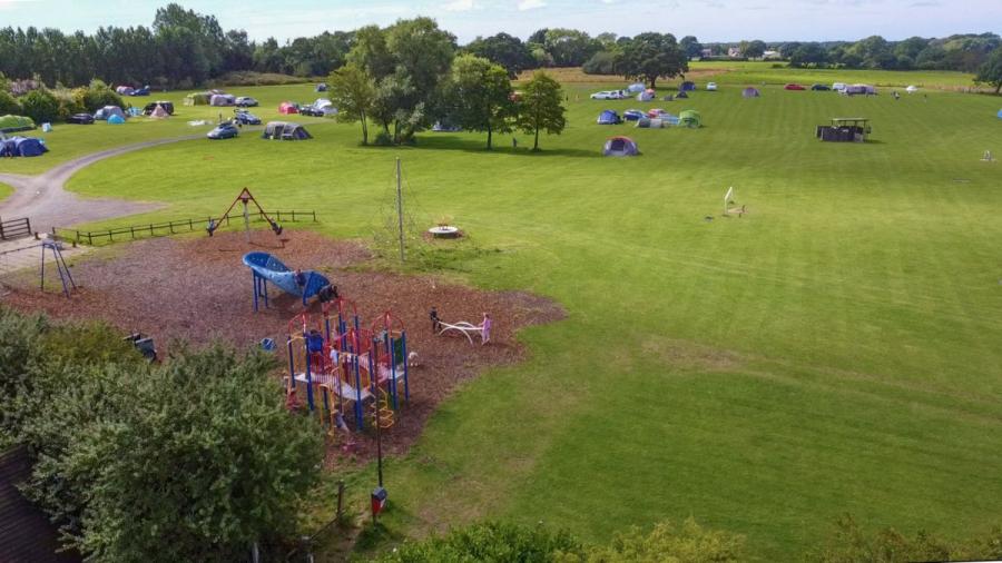 Royal Umpire Holiday Park large field for camping holidays