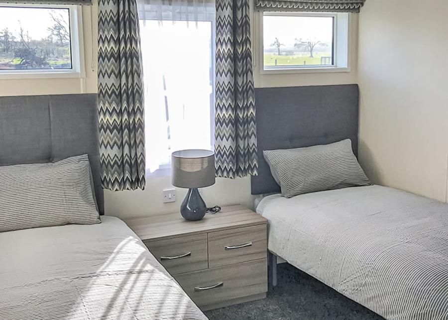 twin room at woods holiday park in alva