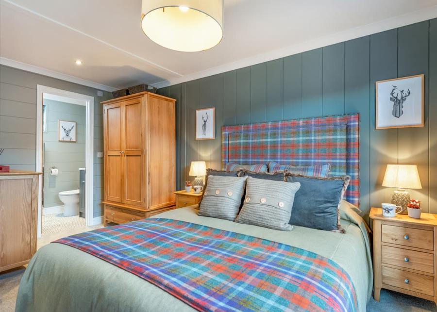 double bedroom at thirlestane woodland lodges in lauder