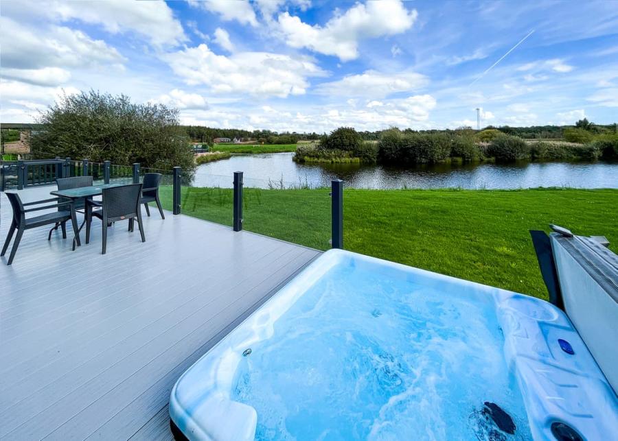 lodge with hot tub at westlands country park in annan