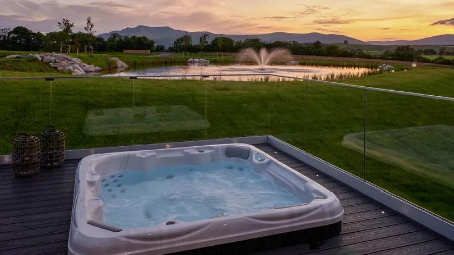 hot tub lodges by the lake at Whitbarrow