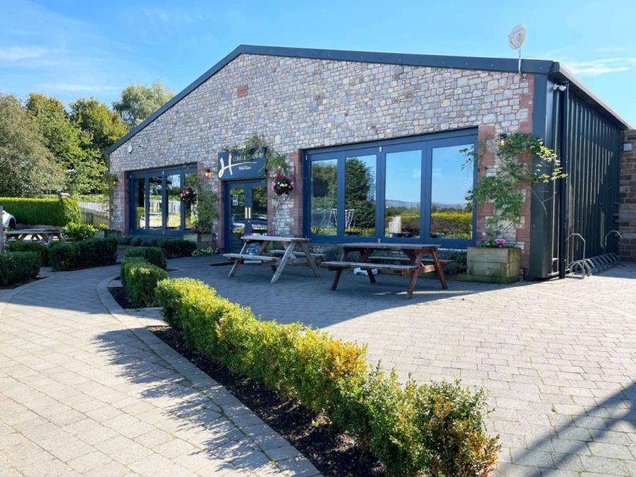 seating outside the leisure complex at Wild Rose Holiday Park