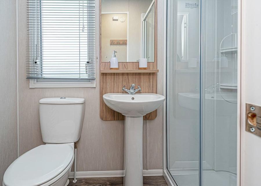 caravan bathroom at woodlands hall holiday park in denbighshire
