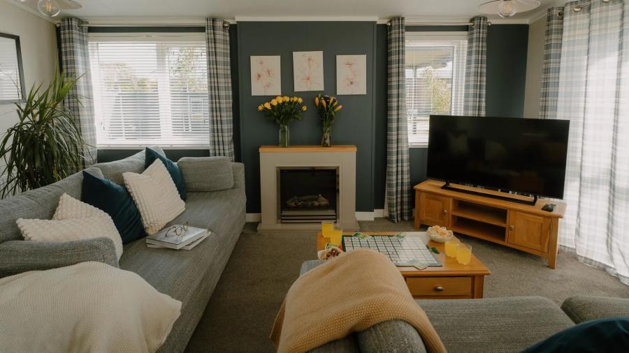 inside a luxury lodge at Angrove Country Park