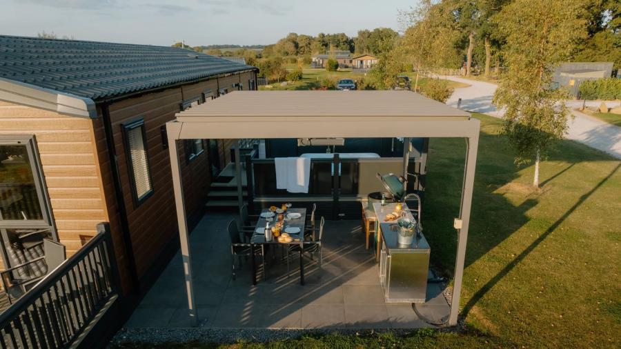 outside a luxury lodge at Angrove Country Park