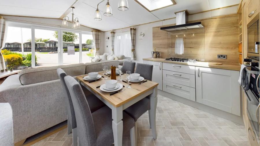 the kitchen and dining area in a luxury lodge