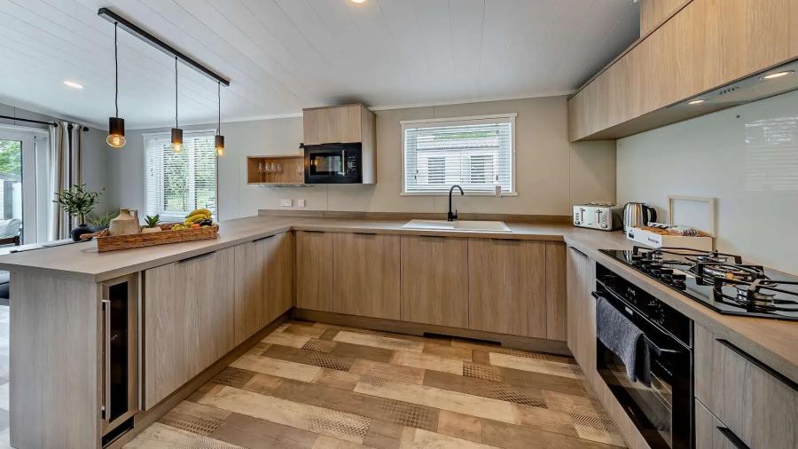 luxury kitchen in a lodge at Bryn Morfydd Lodge Park