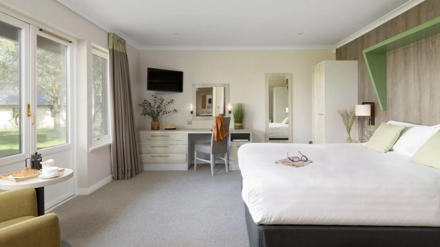 bedroom in a luxury lodge at Hexham Lodges