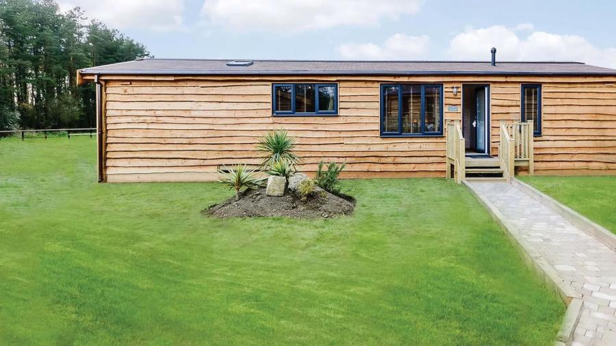 the exterior of a lodge at Marwell Resort
