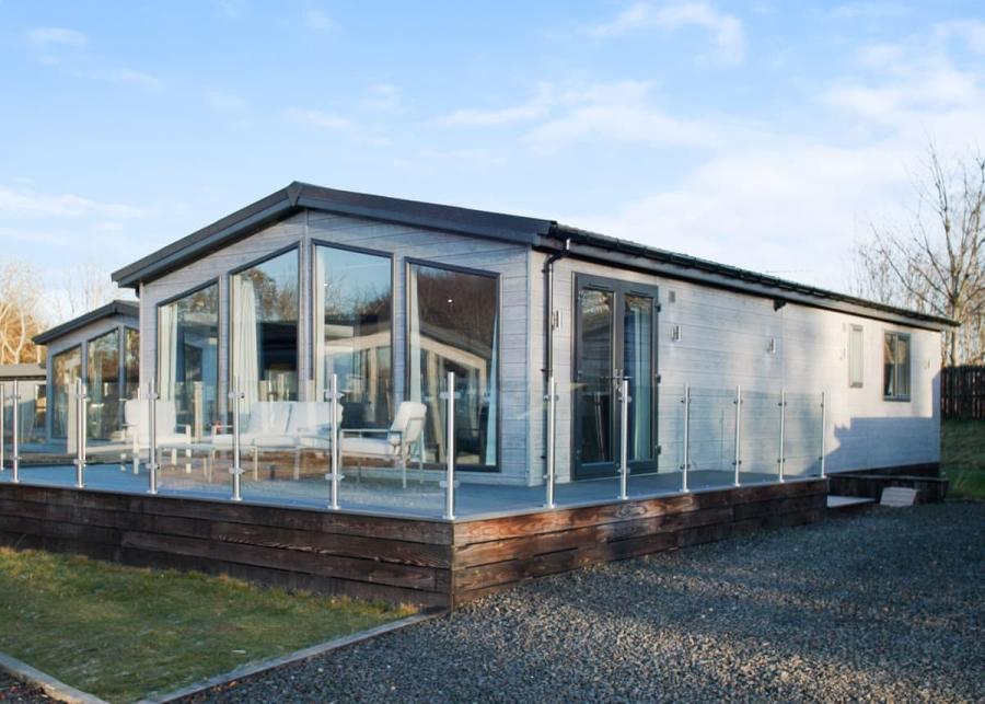lodge with deckig at silverwood holiday resort in perthshire