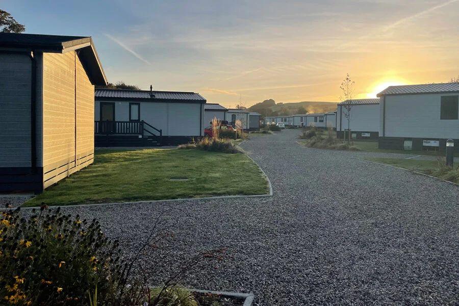 caravans at sunset at Sun Haven Holiday Park