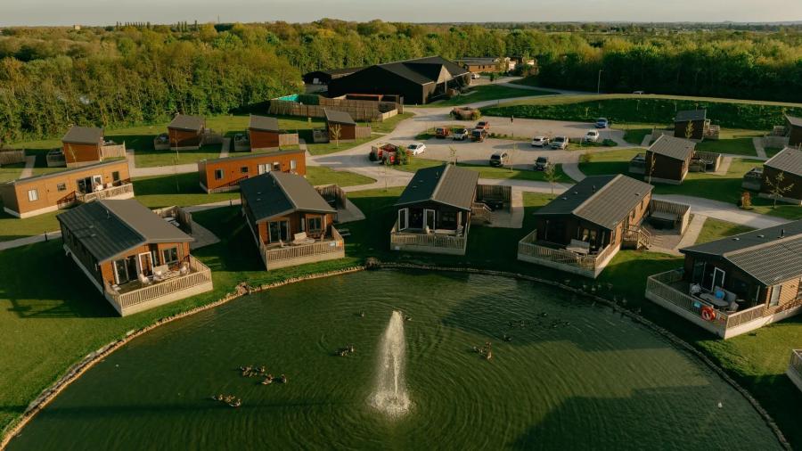 view looking down on the lodges at Woodland Lakes Holiday Resort
