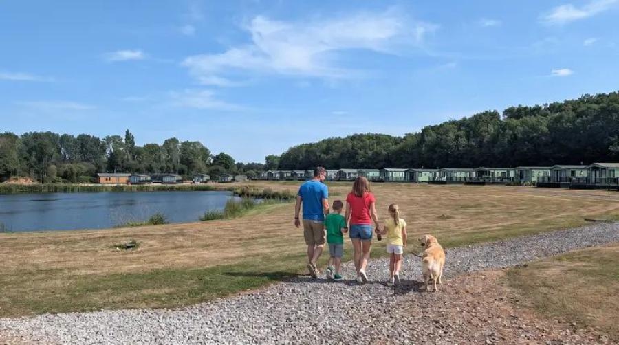 walking around the fishing lake at Kingfisher Holiday Park